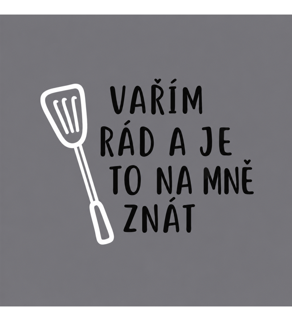 Šedá zástěra s nápisem Vařím rád a je to na mě znát