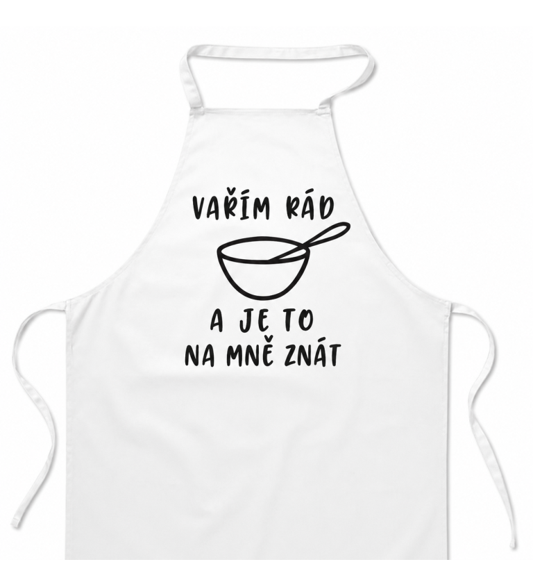 Bílá zástěra s nápisem - Vařím rád a je to na mě znát