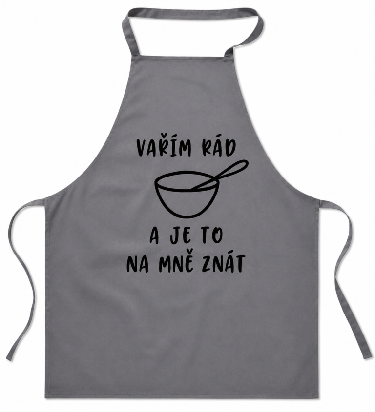 Šedá zástěra s nápisem - Vařím rád a je to na mě znát